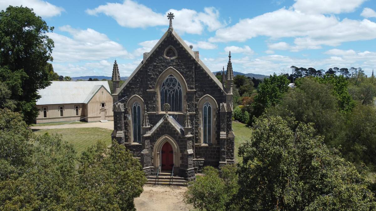 Highpoint: St Paul's Anglican Church stands on a hill overlooking Clunes. The bluestone church is 150 years old and requires constant maintenance. Picture: Rod Tregear.