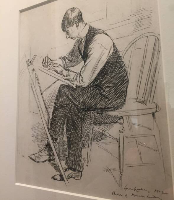(Left) Fifth of ten children: a sketch of Norman Lindsay at work drawing, done by his brother Lionel in 1902. Picture: Caleb Cluff, courtesy Creswick Museum.