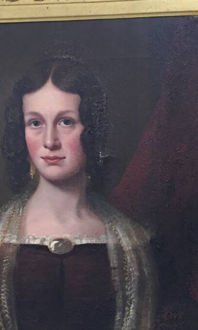 Damage and repair: A closer view of the portrait of Elizabeth Henderson. Cracking and bubbling can be seen to the right of the image. Photo: Caleb Cluff.