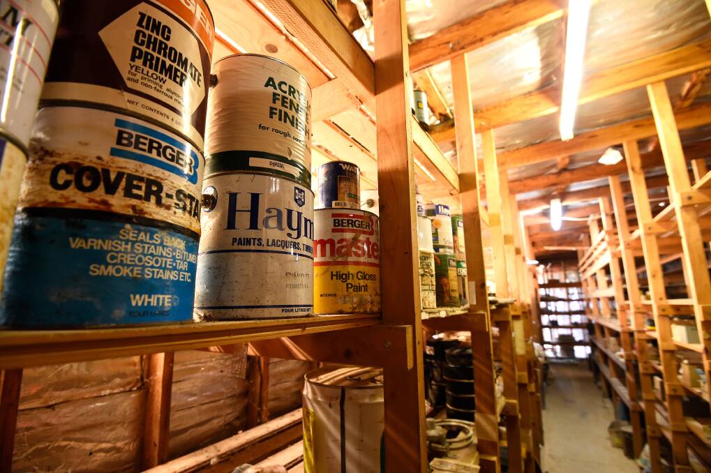 Paints past: These old tins of paint were just some of the stock left over when Pasco's Hardware closed their doors. Picture: Adam Trafford.