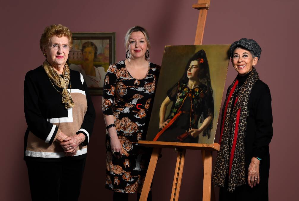 A gift of the Women's Association: Nornie Gude's portrait of her her mother. From left: Women's Association president Janet McCulloch; gallery director Louise Tegart; Nornie Gude's daughter Anne Scott Pendlebury. Picture: Adam Trafford.