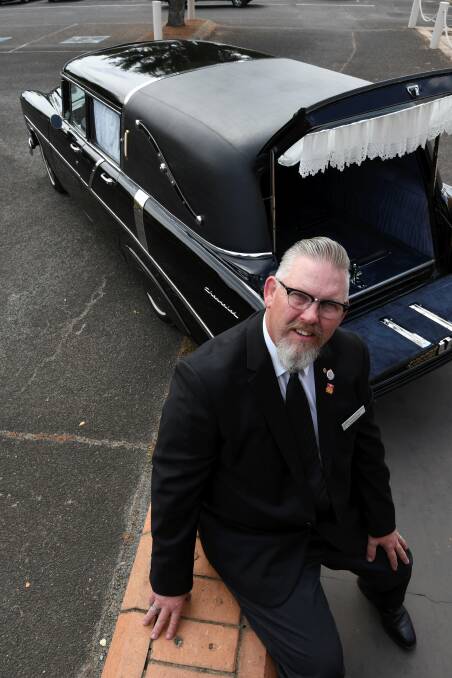 Left: Andrew Nuske of Verey Funerals says his Chevrolet hearse brings a bit of rock and roll to some funerals. Picture: Lachlan Bence.