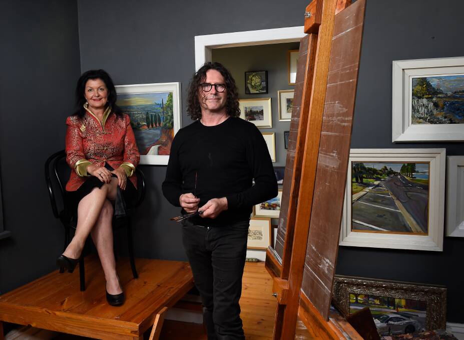 Like minds: Artist Garry Anderson with councillor Samantha McIntosh sitting for her portrait, which is near completion. Picture: Adam Trafford.