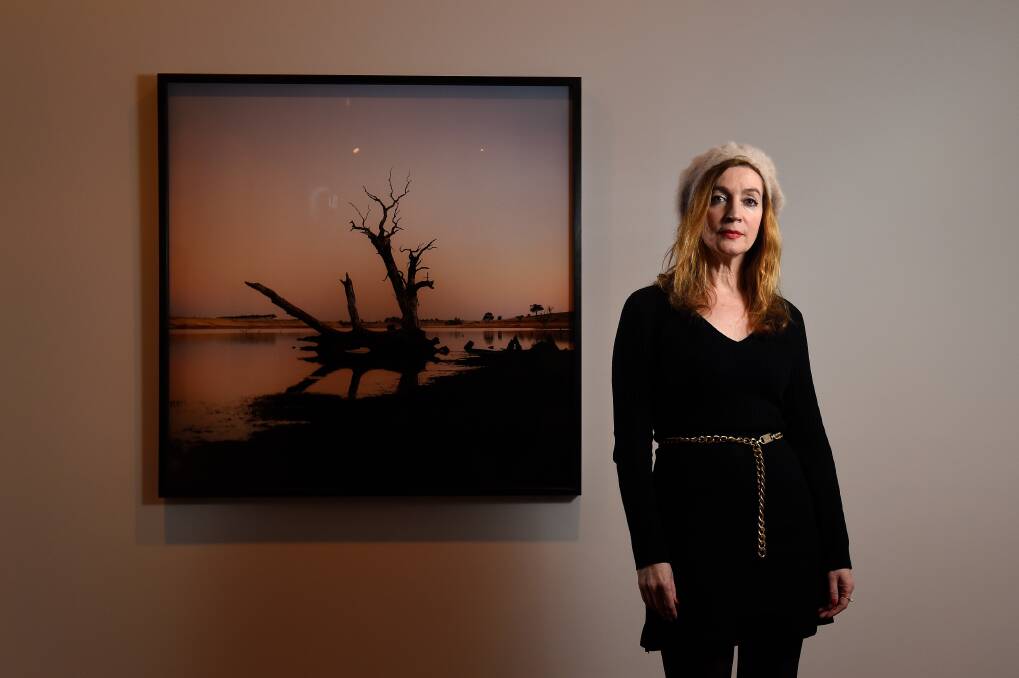 Commission: Photographer Jane Burton with one of her works for The Art Gallery of Ballarat. Picture: Adam Trafford.