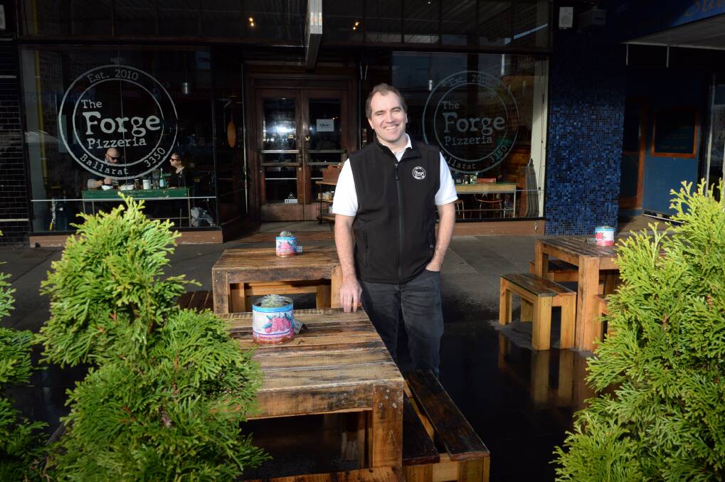 Power upgrade needed: Tim Matthews of The Forge says increases in the amperage of power supplies would help businesses in Armstrong Street become activated. The street has become the centre of food retail in Ballarat in recent years. Picture: Kate Healy.