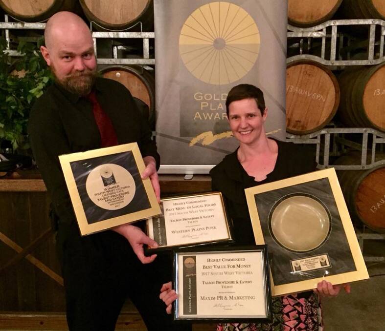 Best licensed cafe: Christopher Howe and Jayne Newgreen of the Talbot Provedore and Eatery with their awards. Picture: supplied.