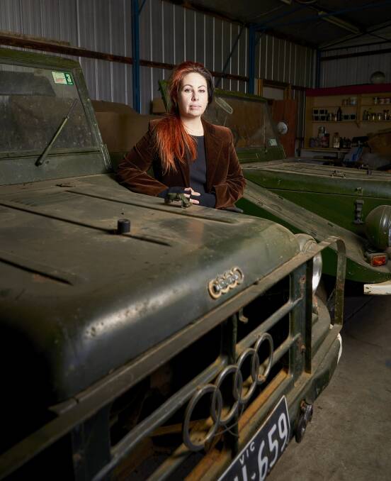 Memories: Suzie McRae stands next to one of the two DKW Mungas her father restored. Picture: Lula Kauzlaric