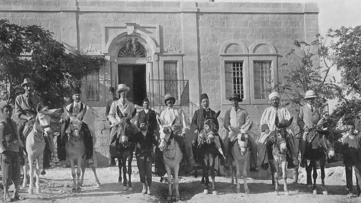 Raiders: Members of the expedition in their colonial finery, Clarence Wilson in the sun-helmet at right. They planned to secretly dig under the Dome of the Rock.