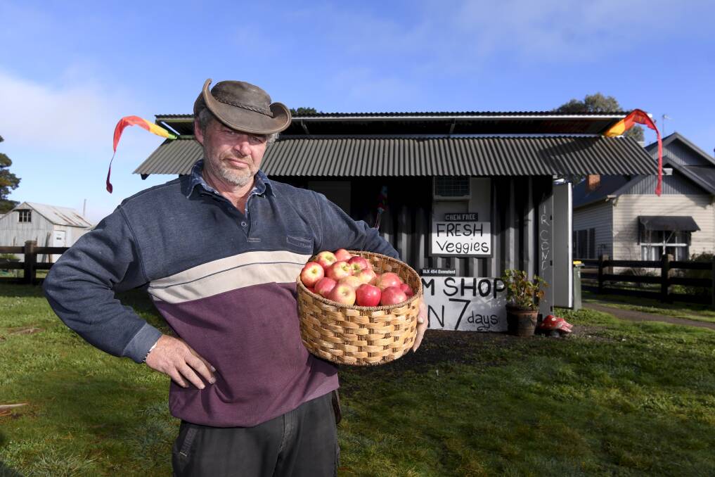 Council vs grower: Market Gardener Jason Waller outside his Evansford stall. He says Pyrenees Council are being excessively rigorous in pursuing him over the legality of his stall, which he's had in one form or another since 2016. Picture: Lachlan Bence.