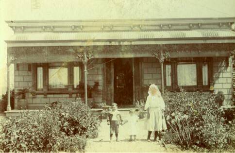 New verandah: A photo of the Chung home in 1907-08, with Mabel Wong Chung and her siblings, Martin and Lillian. Picture: BINDY TREMBATH.
