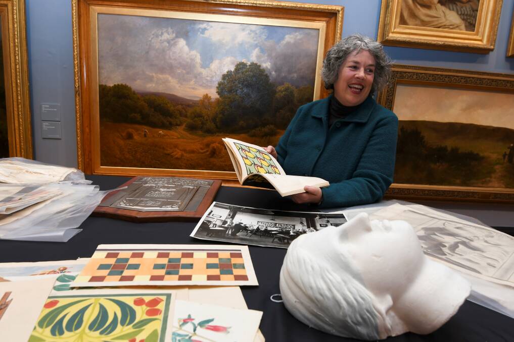 Rare collection: Dr Clare Gervasoni with some of the works she'll be discussing at the gallery tonight. Picture: Lachlan Bence.
