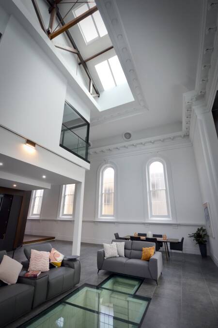 Skylights and baptismal pool: the interior of the restored building.