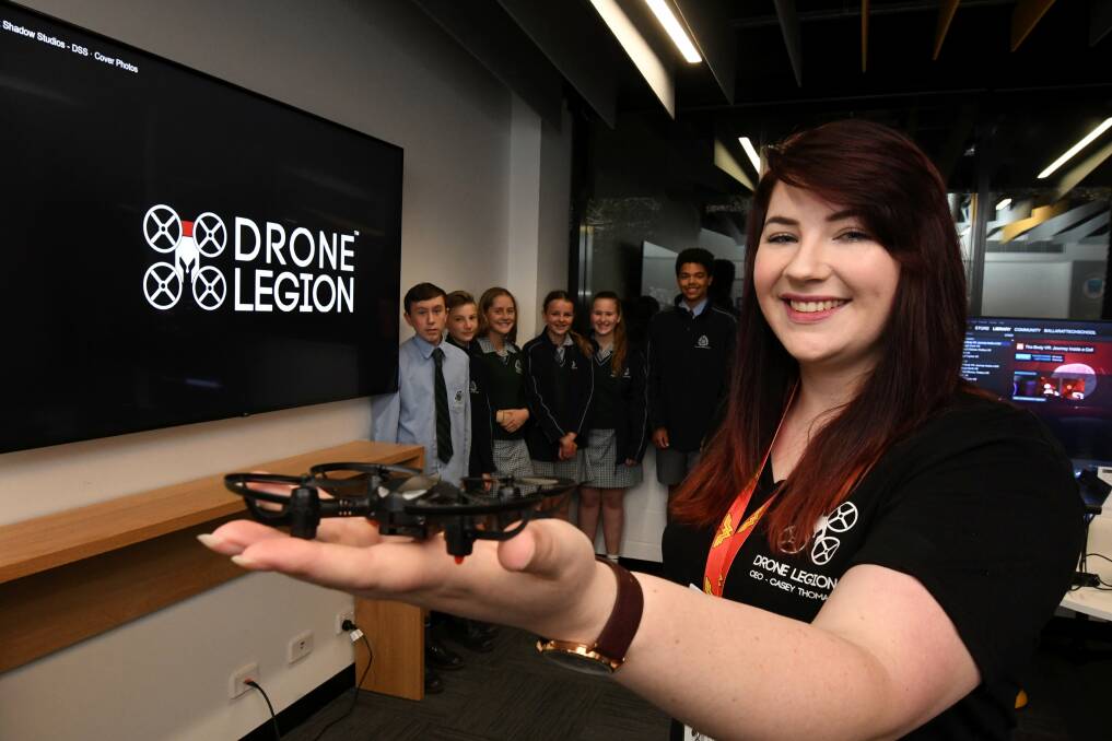 A legion of fans: Dark Shadows CEO Casey Tomas with students from Ballarat High School. Dark Shadows's Drone Legion has been nominated in two categories at the Australian Games Awards. Picture: Lachlan Bence.