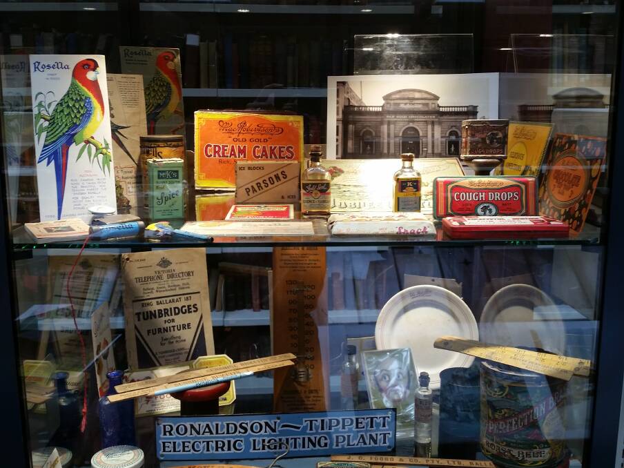 The Ballarat life: a display case of advertising and promotional; ephemera and other objects at the exhibition. Picture: BMI.