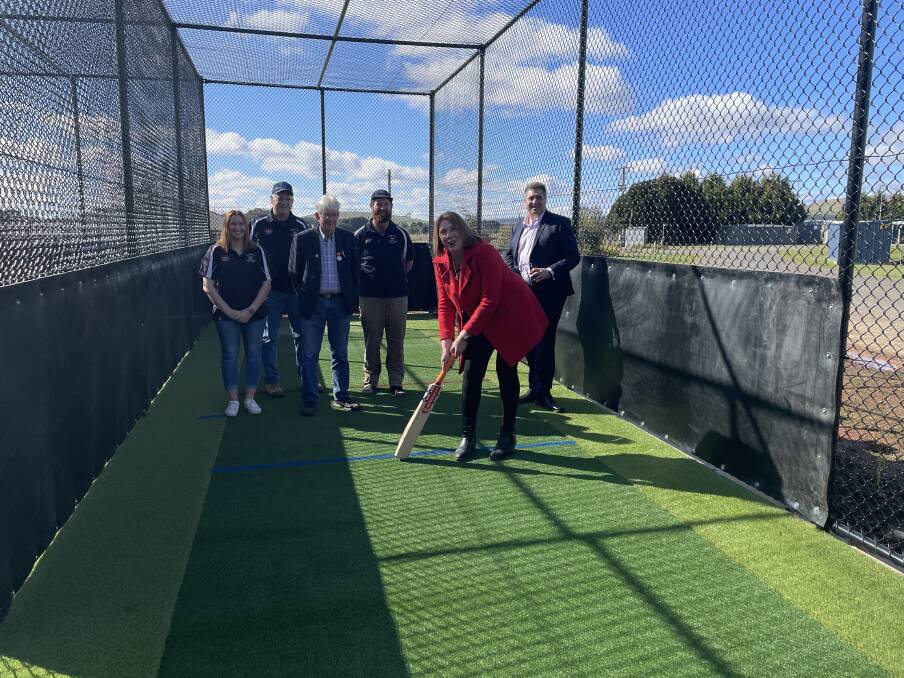 Batting on: Newlyn Cricket Club's Shannen Slater, Craig Slater, and Ben Dimond with federal Ballarat MP Catherine King, Hepburn Shire councillor Don Henderson and shire CEO Brad Thomas opening Newlyn Recreation Reserve's new cricket nets. Picture: CALEB CLUFF.