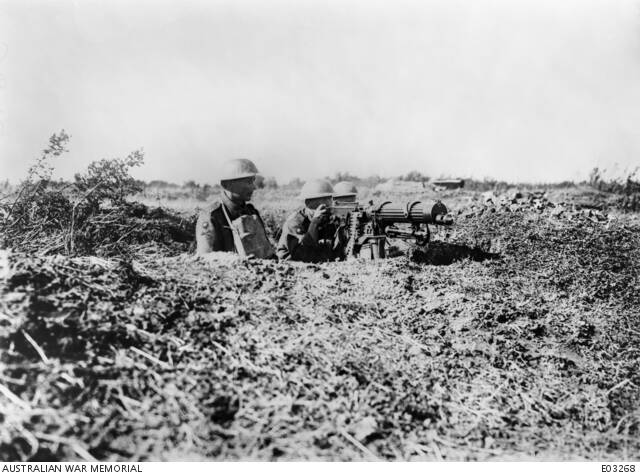 In the trenches: Australian machine gunners manning a Vickers on the Western Front. At the end of the war, four machine gun battalions were in France. Picture: Australian War Memorial EO 3268.