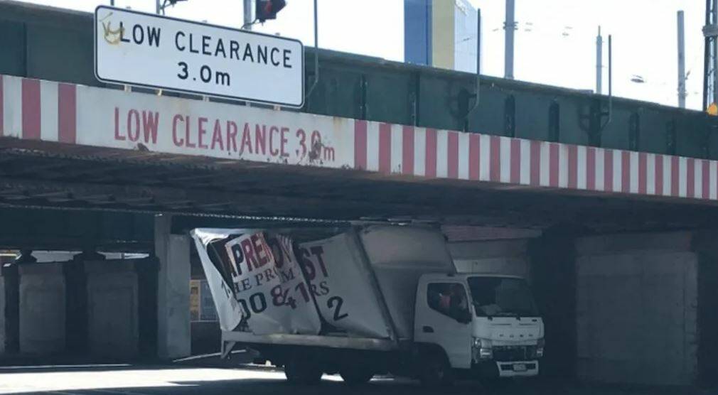 Another accident: the truck wedged under the Montague Street overpass in South Melbourne on Tuesday. Picture: The Age.