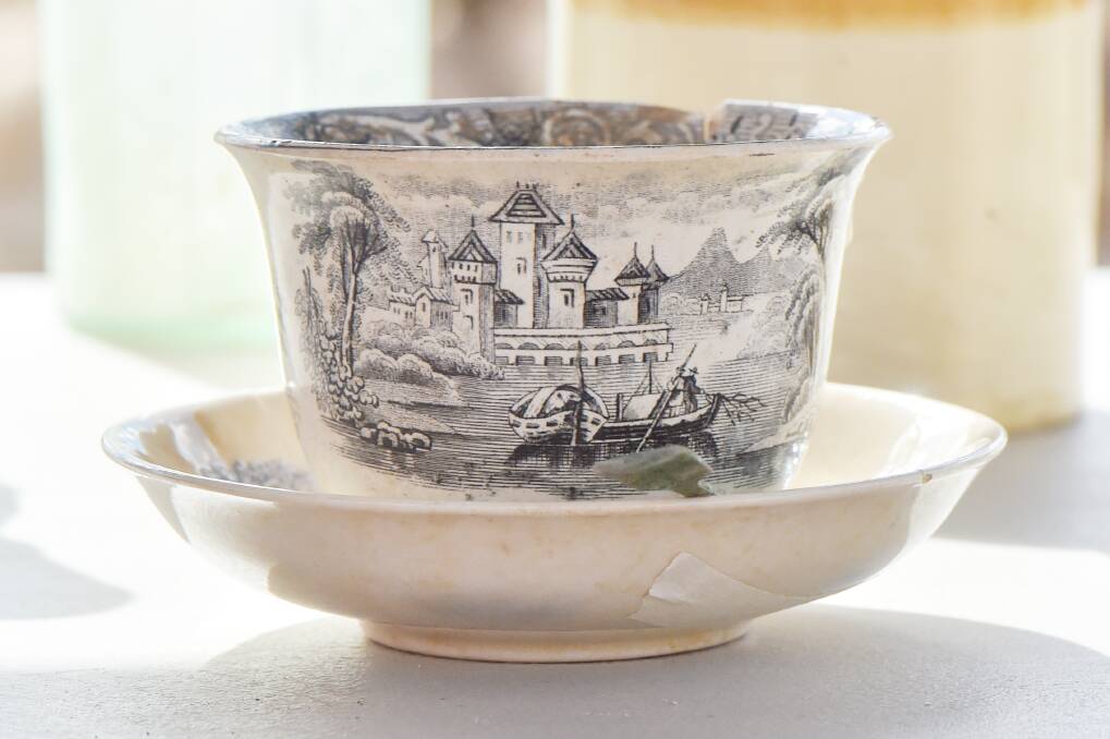 Uncovered: A teacup and saucer recovered from the Bendigo Gov Hub dig. Picture: Darren Howe.