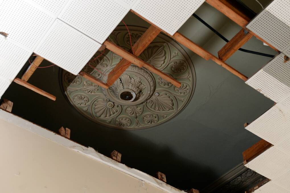 A hidden rose: this ornate ceiling rose was hidden behind a false ceiling. Picture: Kate Healy.