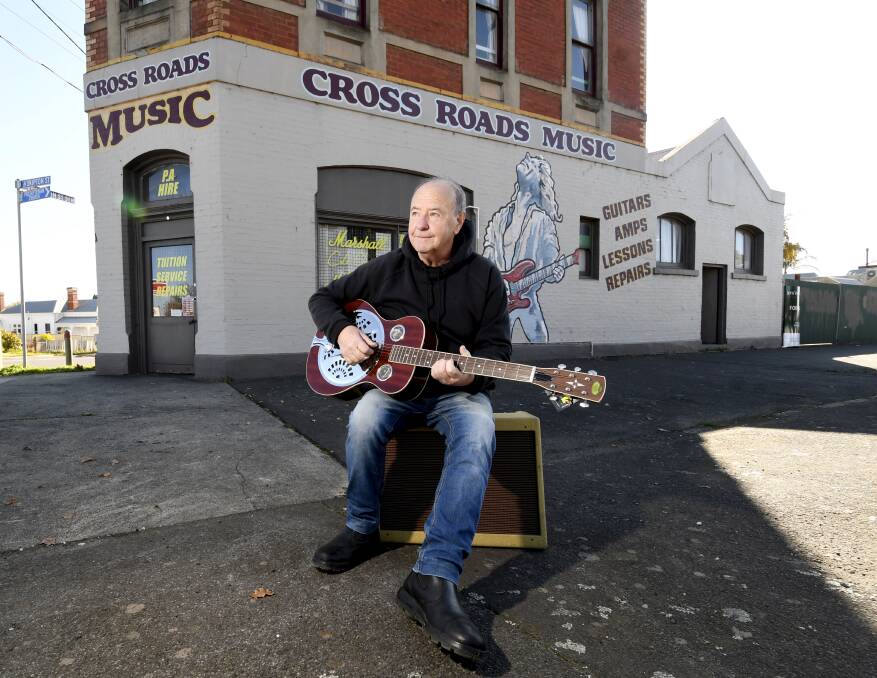 Going down from the Crossroads: Kevin Thompson outside the iconic home of his music store in Skipton St, which he's selling. He will continue his music shop elsewhere. Picture: Lachlan Bence.