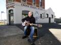 Going down from the Crossroads: Kevin Thompson outside the iconic home of his music store in Skipton St, which he's selling. He will continue his music shop elsewhere. Picture: Lachlan Bence.