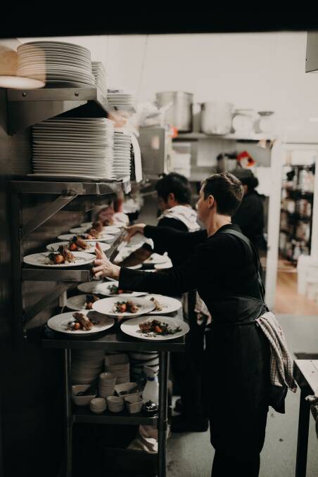 Plating up: the kitchen of Talbot Provedore and Eatery running at full stretch during a seasonal dinner. Held every three months, the dinners are very popular.