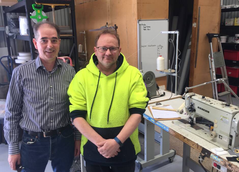 New beginning: Dr Paul Miller (left) with Lindsay Brown of Peppercorn Canvas. Brown started his business after 32 years employed with a company in Ballarat. Picture: Caleb Cluff. 