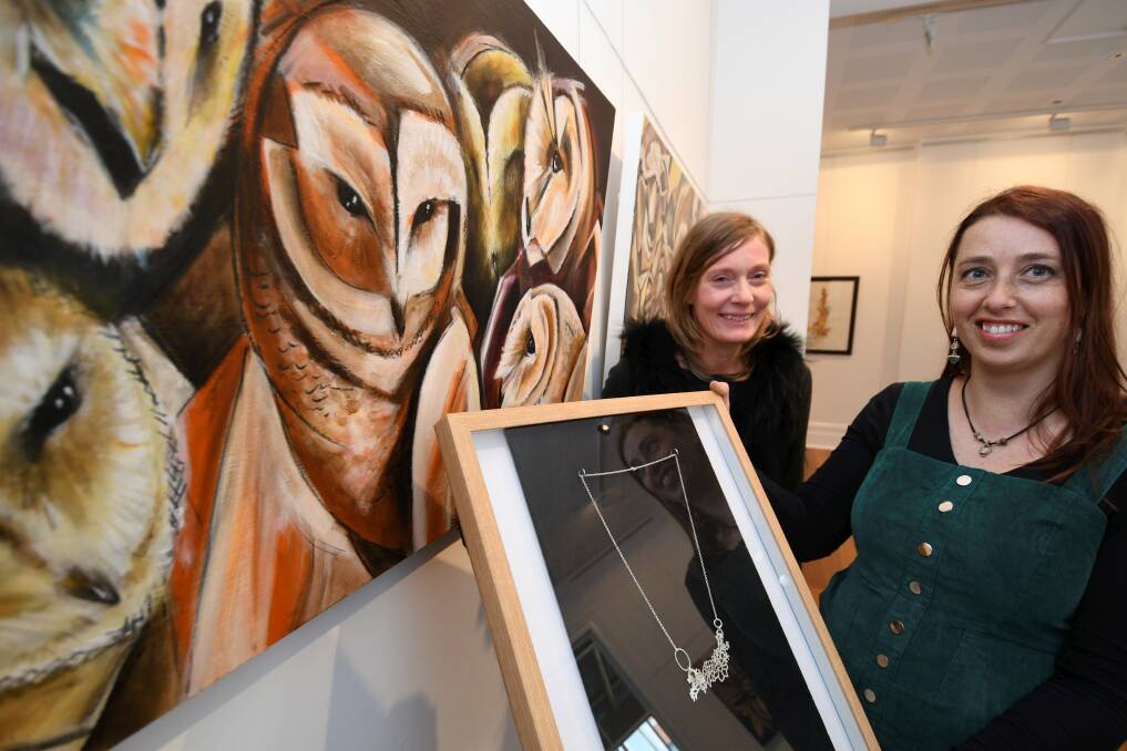 Responses to the environment: Catherine Ratcliffe (l) and Rachael Grose with their work at the Backspace. Picture: Lachlan Bence. 