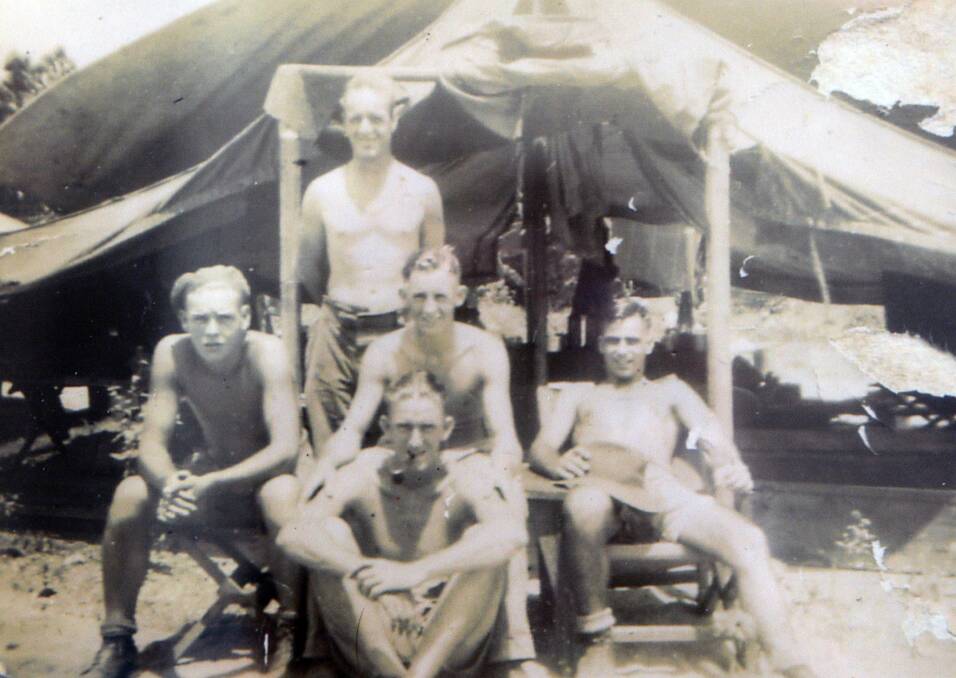 Fit and young: Mark Carroll (centre) with his gunnery mates in New Guinea.