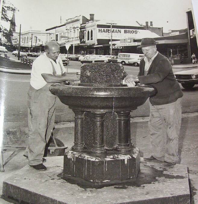 1970s: Les Waight senior and a colleague restoring a fountain on Sturt St.