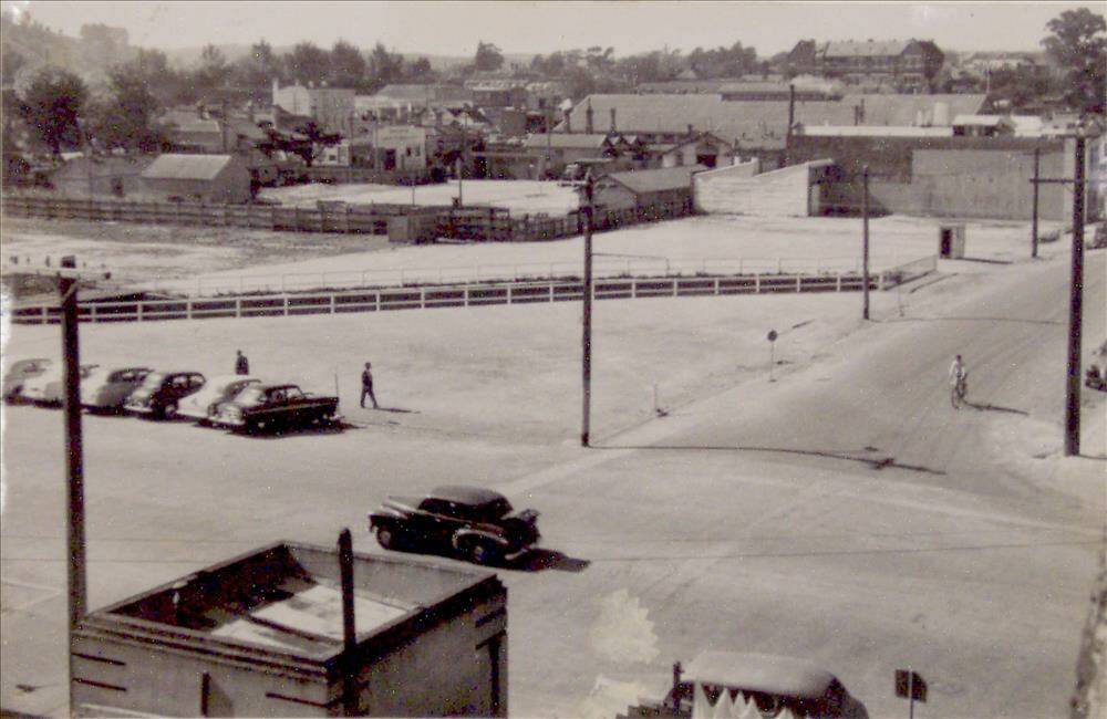 A different city: This image, held by the Ballarat Historical Society, shows the corner of Curtis and Grenville streets, with Brown's Confectionery in the middle and Humffray St State School in the far background, and the Yarrowee channel open.