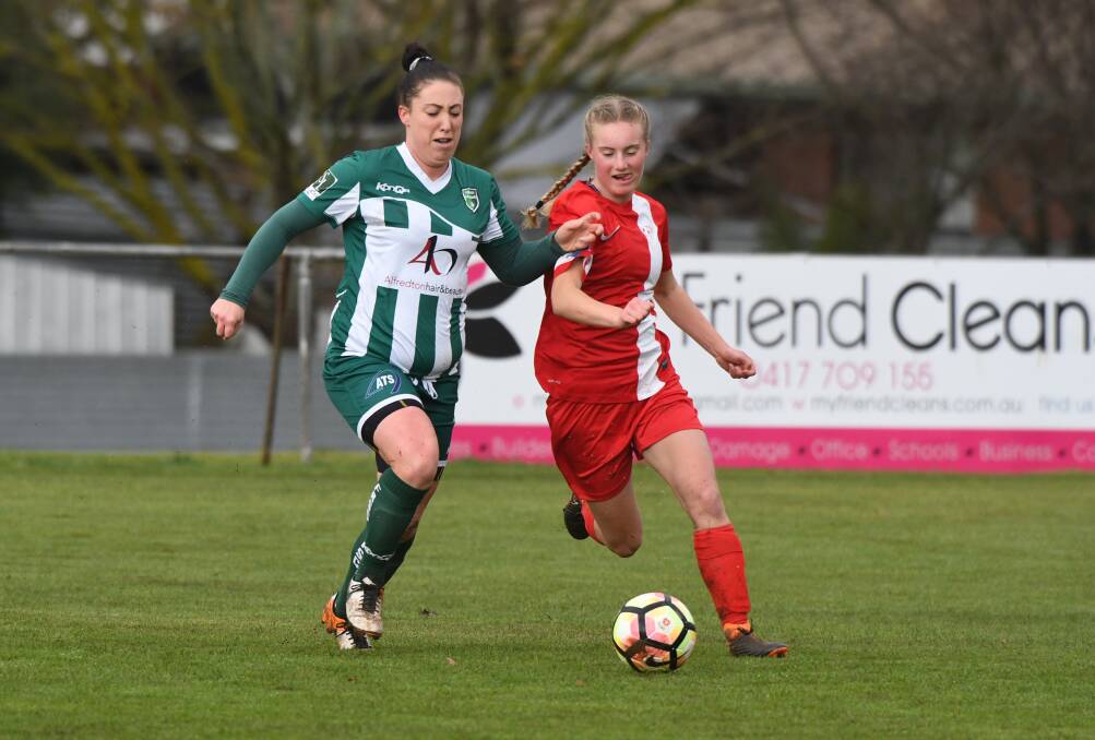 CHASE: Forest's Rebecca Dale and Ballarat's Lily Fraser track the loose ball during their BDSA women's clash on Sunday. Picture: Kate Healy