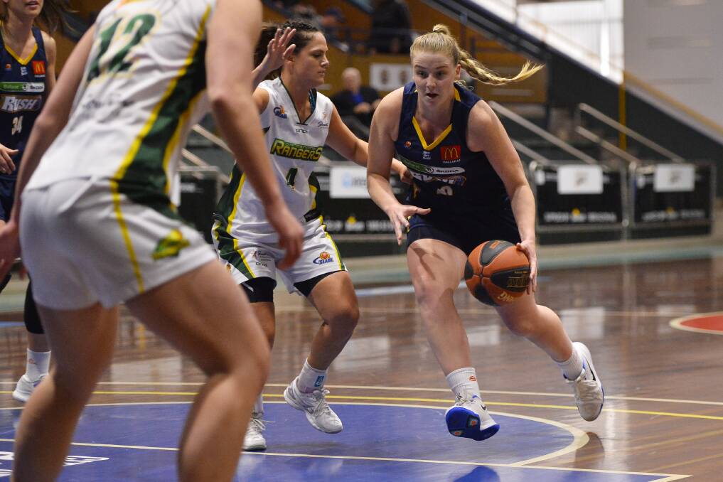 DRIVE: Ballarat Rush's Ashleigh Spencer cuts her way to the basket against Dandenong on Sunday. Picture: Dylan Burns