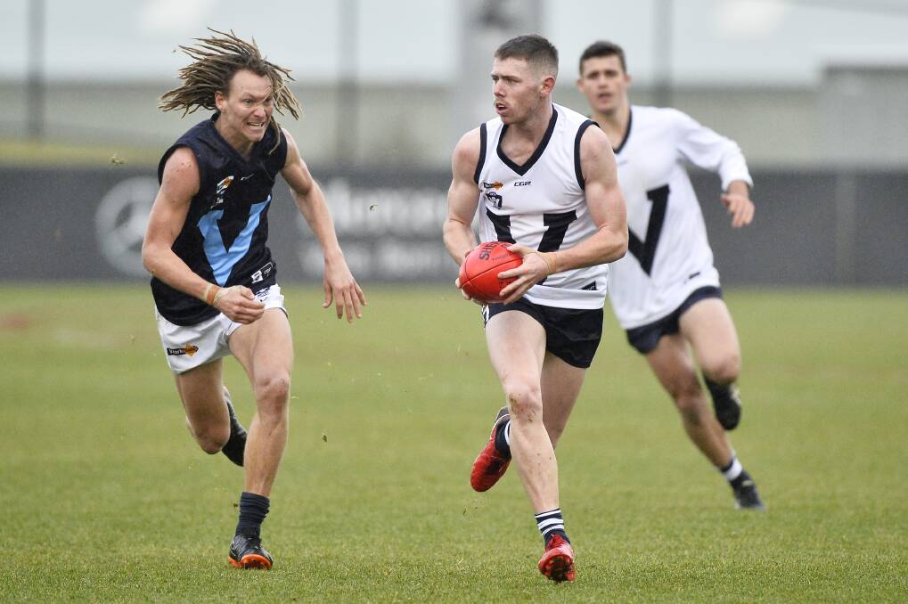 RUNNING MAN: Sunbury's Lachie Bramble roamed the wings for Vic Country during its 25-point win over Vic Metro for the AFL Victoria Community Cup. Picture: Dylan Burns