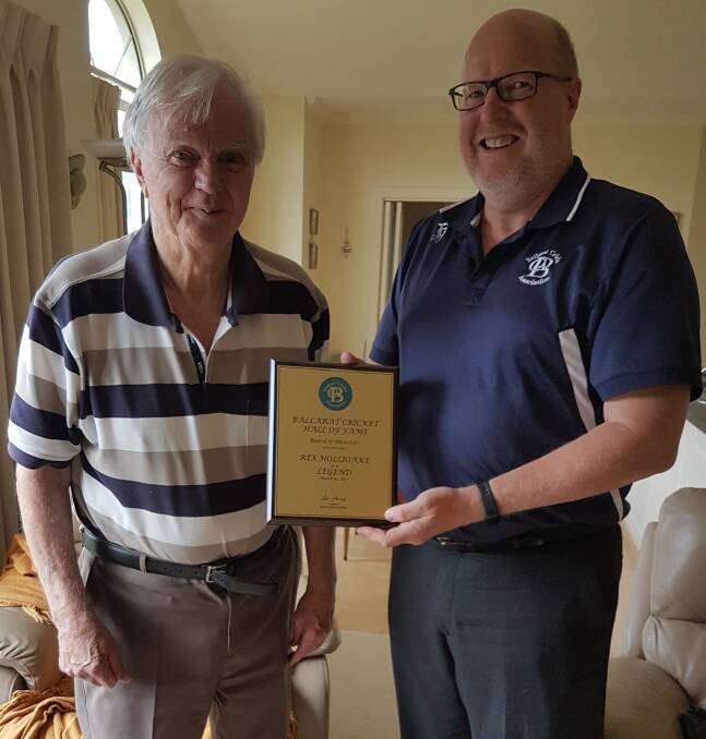 LEGEND: The Ballarat Cricket Association's first legend Rex Hollioake receives his plaque from BCA president Rob Florence.