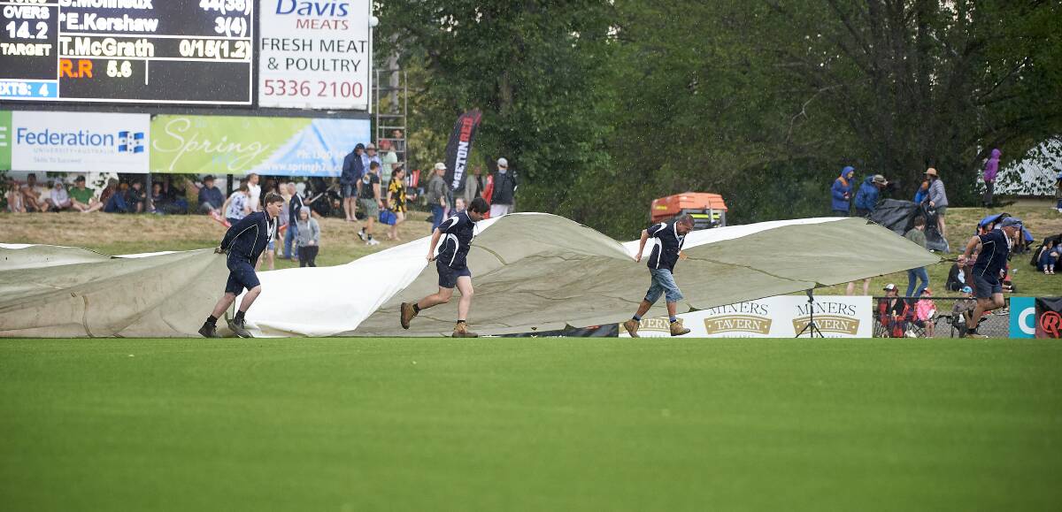 The covers come on at Eastern Oval last week.