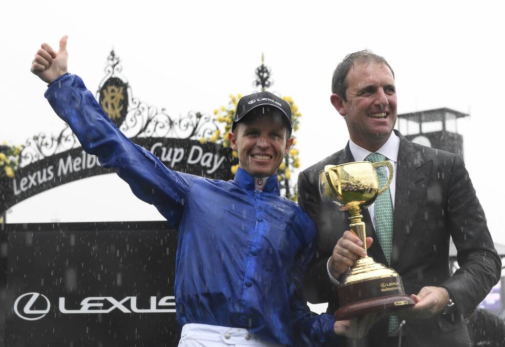 RAPT: Melbourne Cup winning jockey and trainer Kerrin McEvoy (left) and Charlie Appleby. Picture: Andy Brownbill