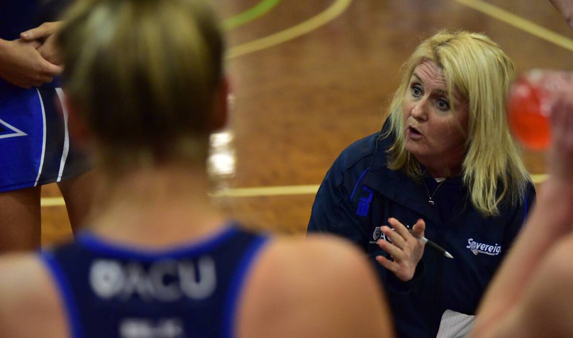 FINALS BID: Sovereigns division coach Kim Bailey addresses the group, her side is the most likely of the three grades to play finals this season. Picture: Brendan McCarthy