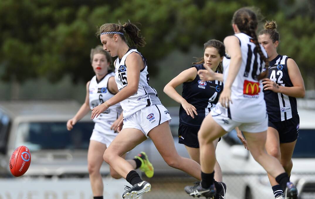 BREAKAWAY: Rebels' Georgia Clarke looks to gather the ball last week against the Geelong Falcons. Picture: Dylan Burns