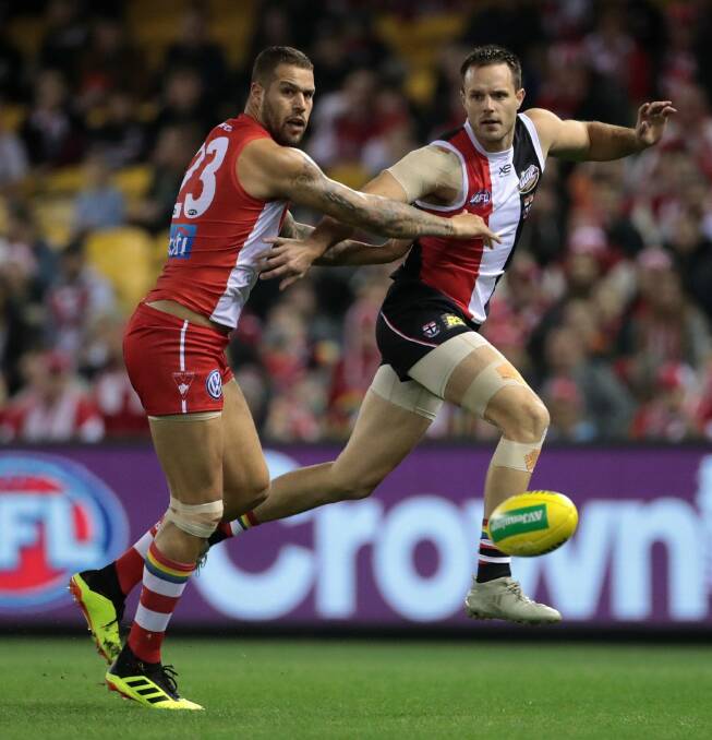 Nathan Brown and Lance Franjlin jostle. Picture: AAP Image/Mark Dadswell