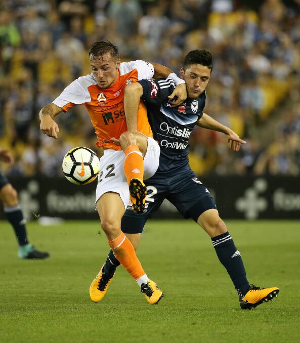 NEW COLOURS: Former Melbourne Victory star Stefan Nigro taking on Brisbane Roar, his new club, in 2017. Picture: AAP Image/ George Salpigtidis