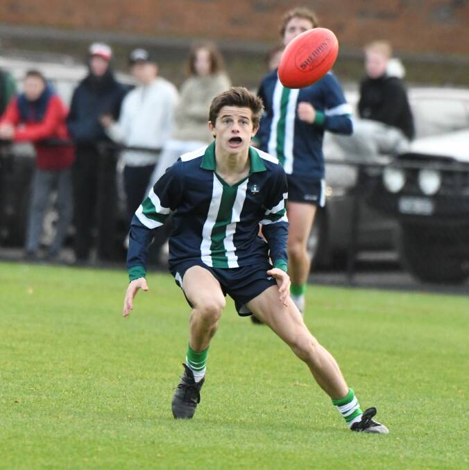 BENCHMARK: St Pat's continued its dominance in BAS football, defeating Clarendon by 76 points, Liam Phillips pictured. Picture: Lachlan Bence