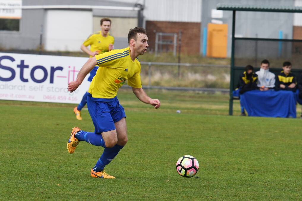 ON THE BREAK: Vikings Matthew Jamieson finds space during the weekend's FFV state league three clash with ladder leader Epping City. Pictures: Kate Healy