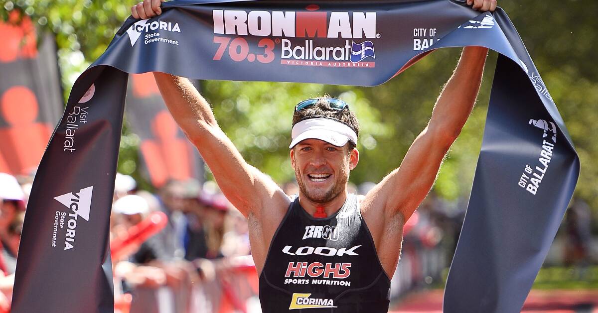 VICTORY: Denis Chevrot crosses the finish line in first position following an enthralling pro men's Ironman 70.3 Ballarat. Picture: Dylan Burns