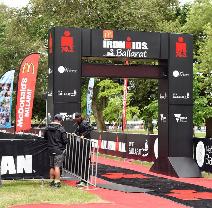 PREPARATION: Ironman officials put the final touches on what will be the finish line for this weekend's Ironman 70.3 Ballarat event.