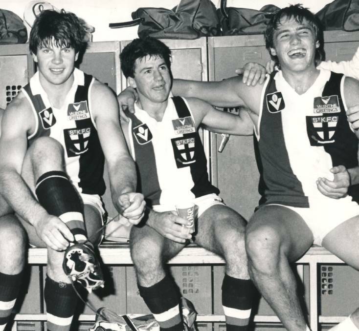 SAINTS COME MARCHING IN: Ballarat exports Danny Frawley, left, with Peter Kiel and Tony Lockett after a St Kilda win in 1984.