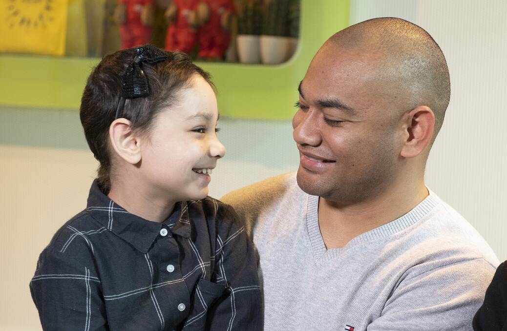 Eight-year-old Violet Uhi and her father Sal Uhi at the Royal Children's Hospital in Melbourne. Picture: Ellen Smith