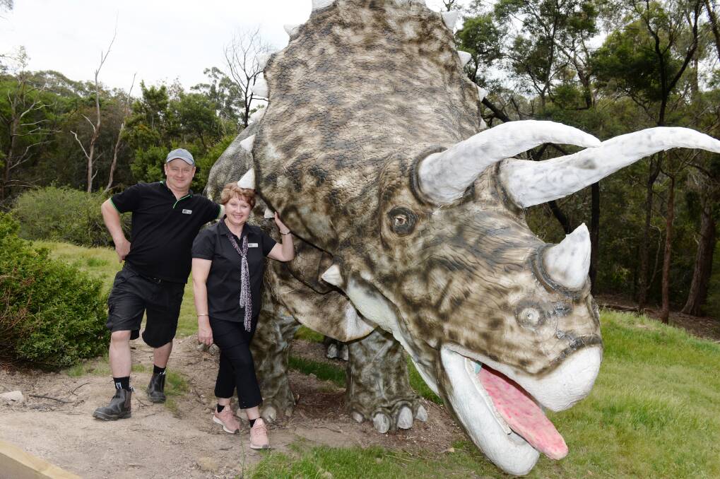 Paul and Lisa Sperber with the animatronic Triceratops. Picture: Kate Healy