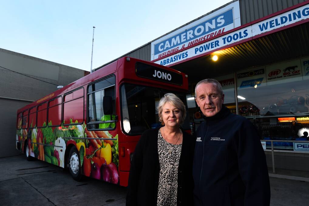 Jenni Crowden, mother of Jonathan who the bus is named after, and volunteer driver Michael Quick. Picture: ADAM TRAFFORD