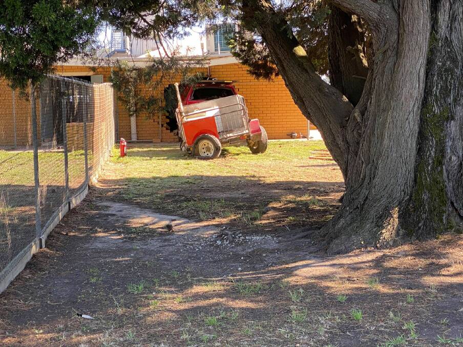 Feature dog race cancelled after ute smashes through wall